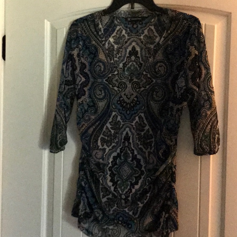 Excellent condition.  3/4 sleeves w/rouched sides.